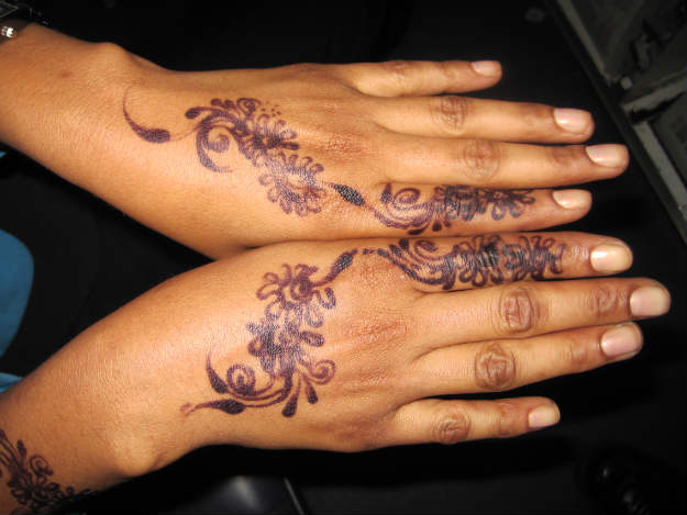 She has this henna design because she attended a Somali wedding